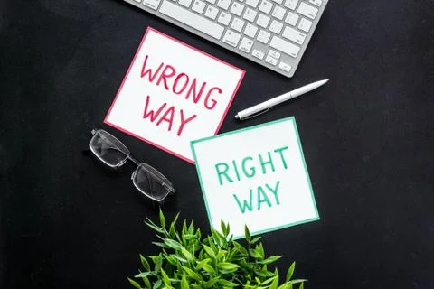 Problem solving. Right and wrong way icons on work desk from above 스톡 사진