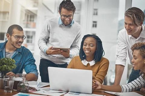 Problem-solving is a seamless process with them. a group of businesspeople 스톡 사진