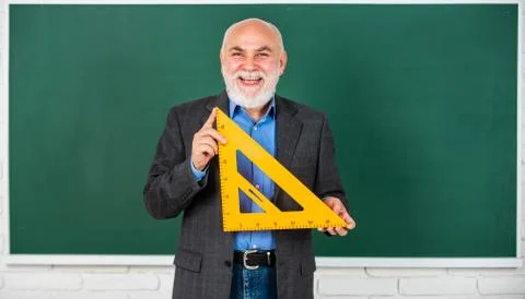 Problem-solving skills. tutor man at blackboard. back to school. Math science Stock Photos