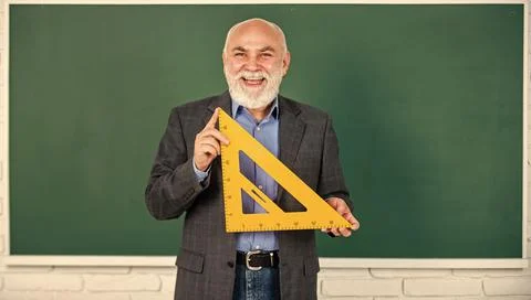 Problem-solving skills. tutor man at blackboard. back to school. Math science 스톡 사진
