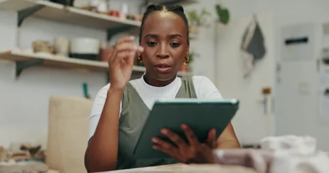 Problem solving, stress and tablet with black woman in pottery boutique for Stock Footage 300653123