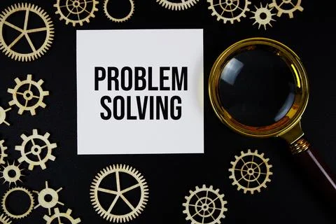 Problem Solving text with magnifying glass on black background Stock Photos