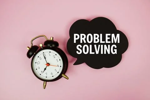 Problem Solving text on speech bubble with alarm clock on pink background Stock Photos