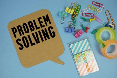 Problem Solving text with stationery on blue background Stock Photos