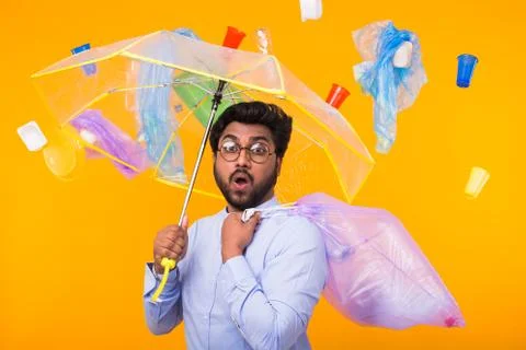 Problem of trash, plastic recycling, pollution and environmental concept - man Stock Photos