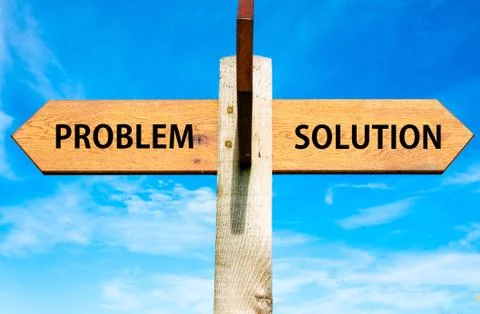 Problem versus Solution messages written on opposite arrows.  Stock Photos