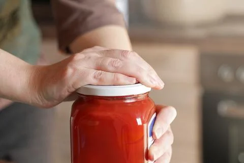 Problem When Working with tightly closed Jars with Pickled Stock Photos