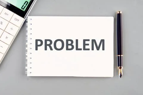 PROBLEM written in a notebook on a gray background Stock Photos