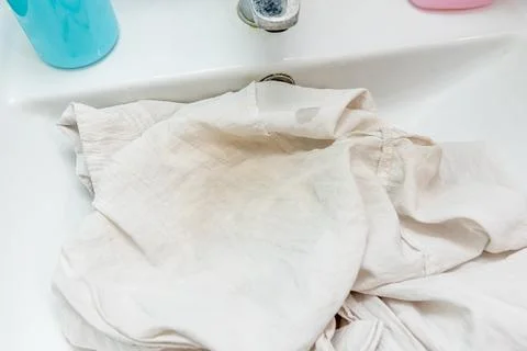 Problem of yellow sweat and deodorant stains on white cloth shirt under armpi Stock-Fotos
