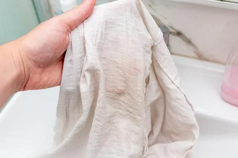 Problem of yellow sweat and deodorant stain on white clothes shirt under ar.. Stock Photos