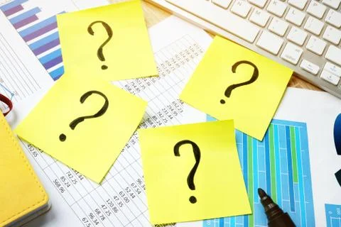 Problems in business. Question marks on sticks. Stock Photos