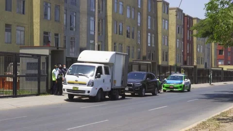 Problems in a condo with a moving truck and cops Stock Footage 150313578