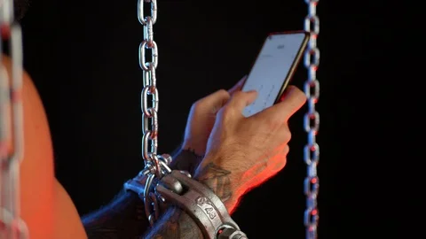 Problems depending on the social networks of the phone and gadgets. bondage Stock Footage 114228592