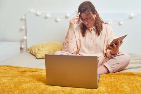Problems with remote work online from home, concept. Sad woman in thought wit Stock Photos