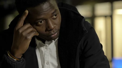 Problems, thoughts - black troubled man thinks about how to solve a problem Stock-Footage 146970673