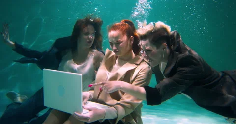 PROBLEMS AT WORKPLACE Two angry female bosses shout at young manager using Stock Footage 171881744