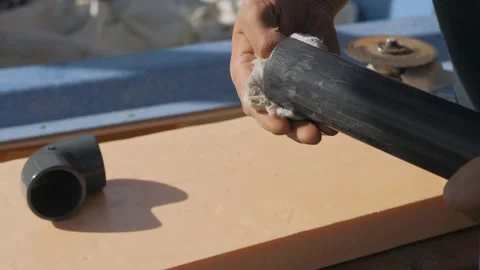 Procedure for degreasing the ends of a plastic pipe. Stock Footage 140814851