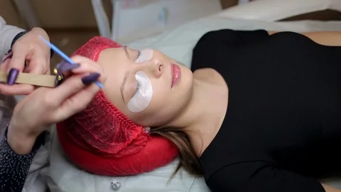 Procedure of eyelashes extension in salon. Stock Footage