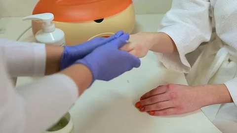 Procedure hands massage in the spa salon. Hand Care in the beauty salon. Massage Stock Footage 75405546