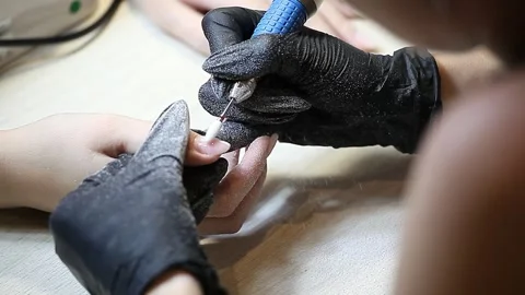 The procedure of hardware manicure, the stage of removing the gel coating Stock Footage 153867422