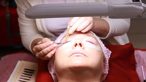 Procedure to increase the volume of eyelashes Stock Footage 92905128