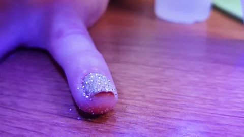 The procedure for manicuring nails, polishing, drying. Video stock 318896646