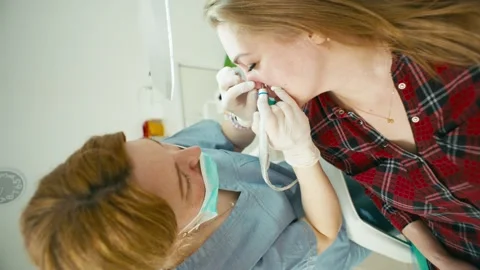 The procedure of removing the vascular mesh with a laser gives the skin youth. Stock Footage 273327877