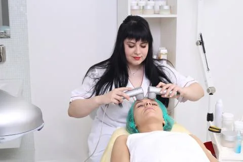 Procedure vibro-cell electrotherapy. Stock Photos