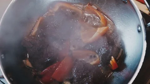 The process of adding coriander in hotpot Stock Footage 73213958