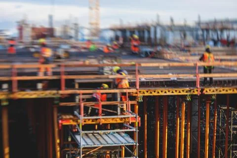 Process of apartment block construction, building site of multistoried reside Stock Photos