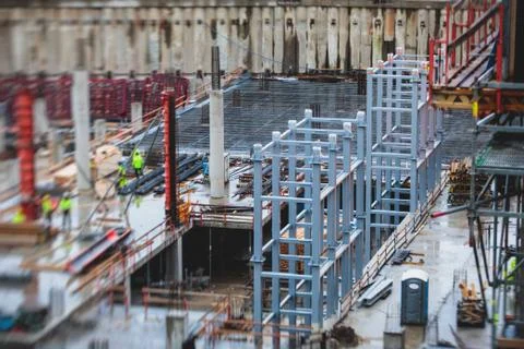 Process of apartment block construction, building site of multistoried reside Stock Photos