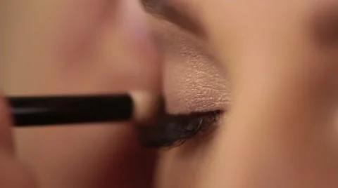 Process of applying eyeshadow, eye make up Stock Footage 67827378