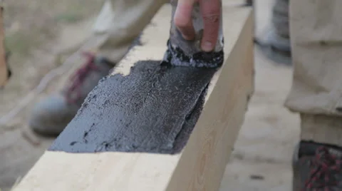 The process of applying liquid bitumen. Video stock 61813294