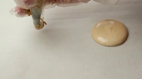 Process of applying macaroon to the baking sheet, closeup Stock Footage 62425919