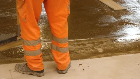 The process of applying the primer to the concrete floor. Video stock 199762197