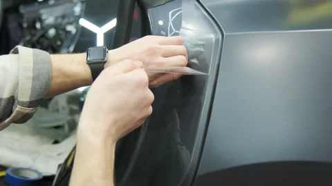 Process of applying a protective PPF fil... | Stock Video | Pond5
