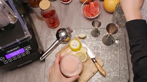 The Process of Arranging Garnish With Fruit Stock Footage 121657382