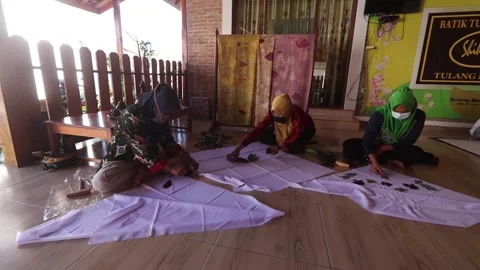 The Process of Artisans Making Ecoprint Batik Stock Footage 287304071