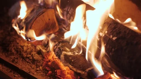 Process of ashing and smoldering logs in burning fireplace Stock Footage 247761526