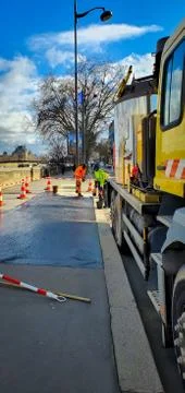 Process of asphalting and paving Stock Photos