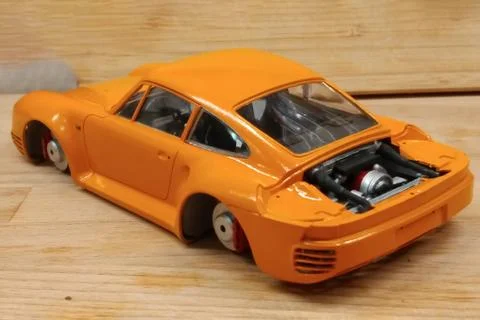 The process of assembling and painting the scale model of the car. Engine,and Foto stock