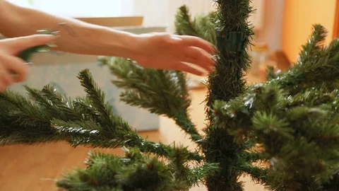 Process of assembling artificial christmas tree Stock Footage 83925808
