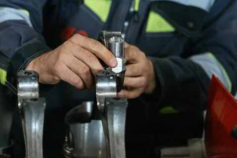 Process of assembling of engine, close up Stockfoto's