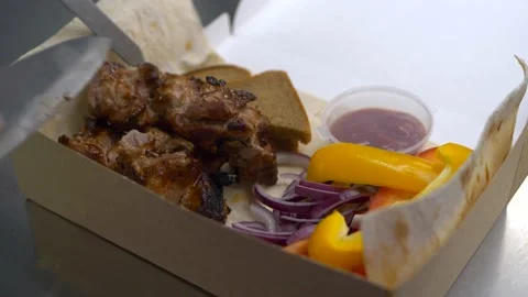 Process of assembling hearty meat lunch for delivery Video stock 151554874