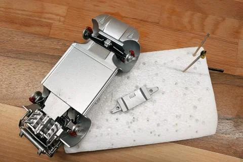 The process of assembling a scale car model. Glued and painted engine, exhaus Stock Photos