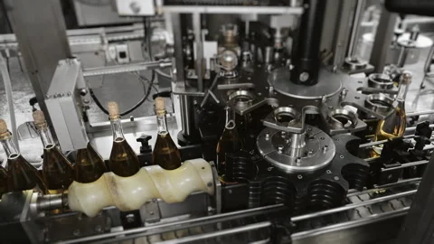The process of attaching corks to champagne bottles. Stock Footage 288549445