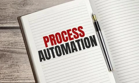 PROCESS AUTOMATION text on brown diary on wooden background 스톡 사진