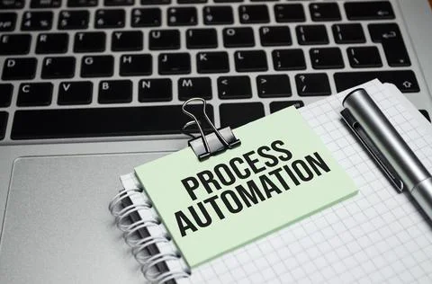 PROCESS AUTOMATION text written on the white background with keyboard Foto stock