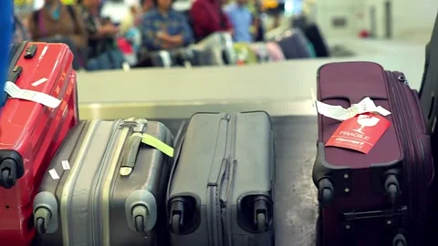 Process of baggage claim for arrival passenger at international airport. va.. Stock Footage 256743454