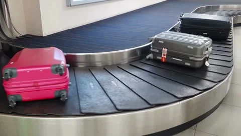 Process of baggage claim for arrival passenger at international airport. va.. Stock Footage 256743542